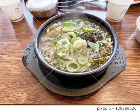 Korean Spicy Beef Tripe and Vegetable Hangover Soup in Stone Pot Korean Spicy Beef Tripe and Vegetable Hangover Soup in Stone Pot 139269626