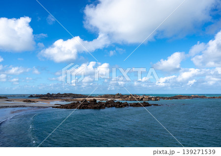 Granite islands and blue waters near Tregastel, Brittany, France 139271539