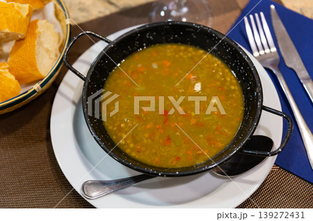 Hearty lentil soup with vegetables 139272431
