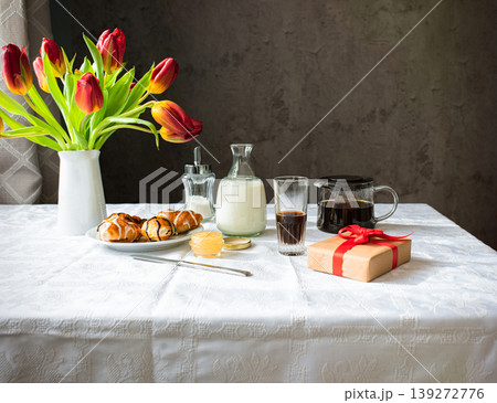 Breakfast with tulips and coffee on the table. 139272776