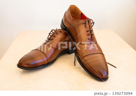A pair of new men's leather boots, photos from different angles 139273094