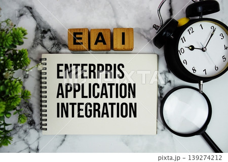 EAI Enterprise Application Integration text with alarm clock and magnifying glass on marble background 139274212