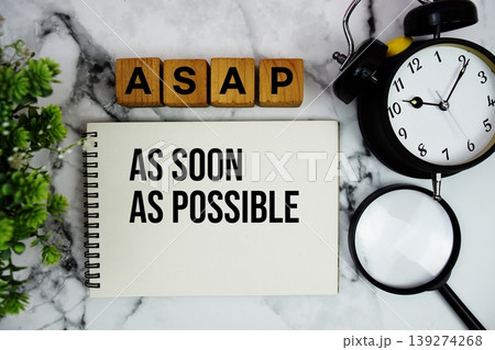 ASAP As Soon As Possible text with alarm clock and magnifying glass on marble background ASAP As Soon As Possible text with alarm clock and magnifying glass on marble background 139274268