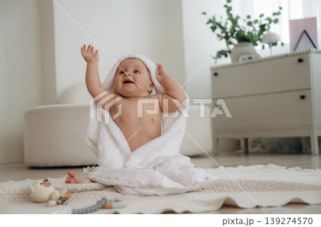 Playful happy little baby is at home in domestic room 139274570