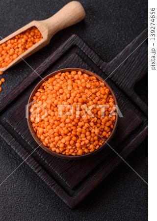 Raw red lentils as a source of protein for a healthy vegan meal. Red lentils Raw red lentils as a source of protein for a healthy vegan meal. Red lentils 139274656