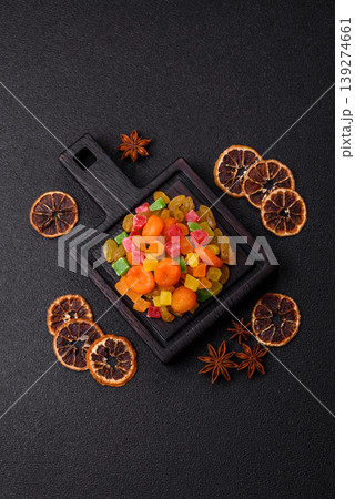 Dried apricots, raisins, and candied fruits as ingredients for baked goods and sweets. Dried fruits Dried apricots, raisins, and candied fruits as ingredients for baked goods and sweets. Dried fruits 139274661