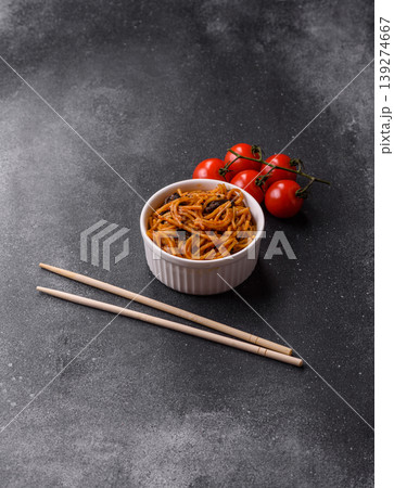 Yakisoba, Asian noodles with vegetables and meat, is a Japanese spicy food. Yakisoba or udon 139274667