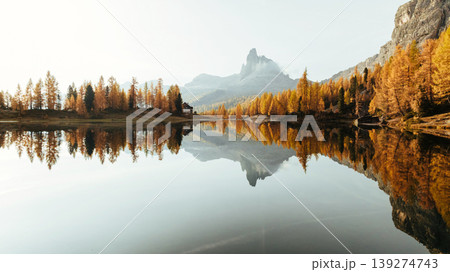 Reflections is in water. Lake Federa near the Croda da Lago mountain at autumn time, majestic landscape, raw nature Reflections is in water. Lake Federa near the Croda da Lago mountain at autumn time, majestic landscape, raw nature 139274743