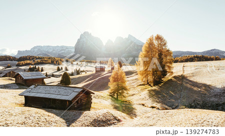 Surface is covered with white snow. Alpe di Siusi, Seiser Alm, aerial view of majestic dolomites, mountains background 139274783