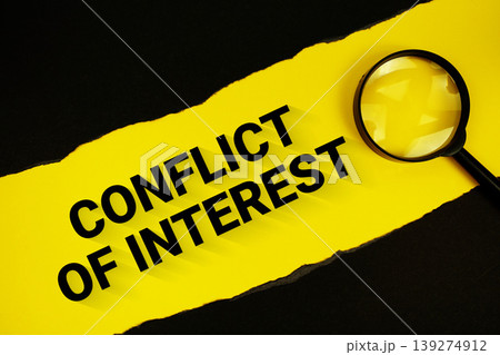 Conflict Of Interest text on yellow with black paper torn ripped and magnifying glass Conflict Of Interest text on yellow with black paper torn ripped and magnifying glass 139274912