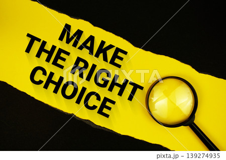 Make The Right Choice text on yellow with black paper torn ripped and magnifying glass 139274935