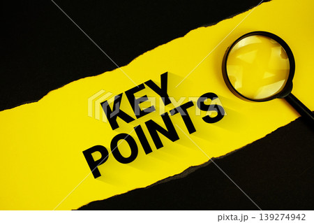 Key Points text on yellow with black paper torn ripped and magnifying glass Key Points text on yellow with black paper torn ripped and magnifying glass 139274942