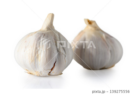 Pair of Fresh Garlic Heads Isolated on White Background Pair of Fresh Garlic Heads Isolated on White Background 139275556