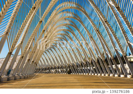 Modern white steel arch structure in Athens Olympic Complex, Greece. Modern white steel arch structure in Athens Olympic Complex, Greece. 139276186