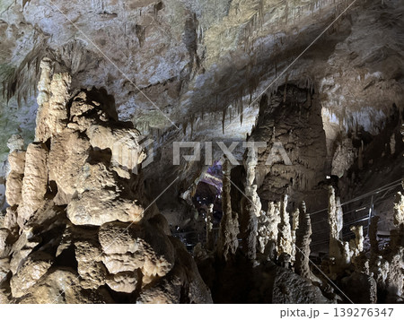 Mysterious stalactites and stalagmites in cave. Geology formation undeground background Mysterious stalactites and stalagmites in cave. Geology formation undeground background 139276347