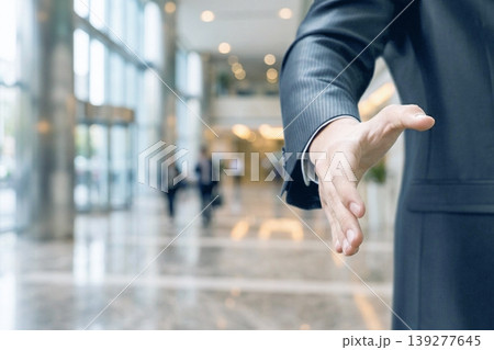 Bizman offers hand 139277645