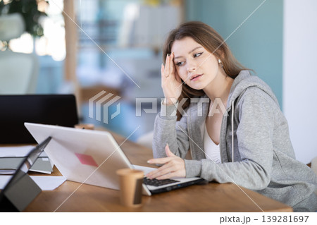 European woman resting while working in the office European woman resting while working in the office 139281697