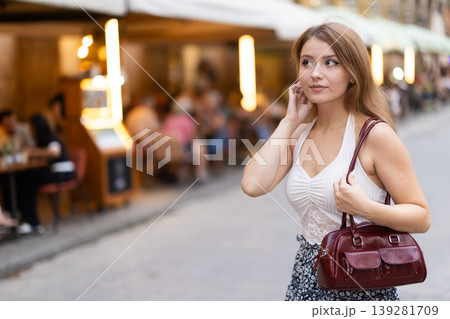 Young woman walking in Royal Square (Placa Real) in Barcelona 139281709