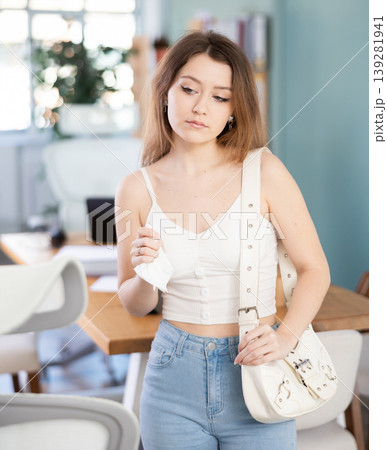 Sad young woman leaving office 139281941