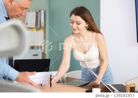 Engineer and architect discussing about blueprint layout design of electricity plan before construction in office 139281953