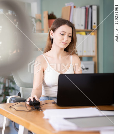 Businesswoman work on laptop in modern company office Businesswoman work on laptop in modern company office 139281961
