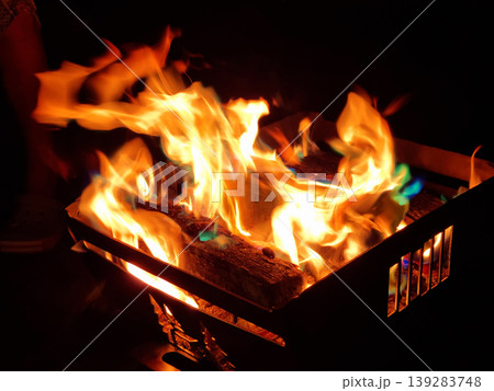 It is a flame rising from a bonfire. It is a flame rising from a bonfire. 139283748