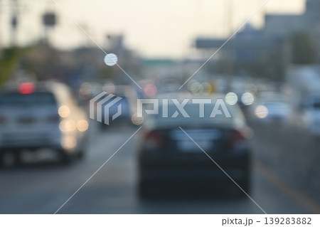 highway traffic with safety barrier on road asphalt, blurred image 139283882