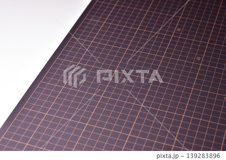 black cutting mat board on white background with line and scale measure guide pattern for object art design, tool equipment of diy craft work 139283896