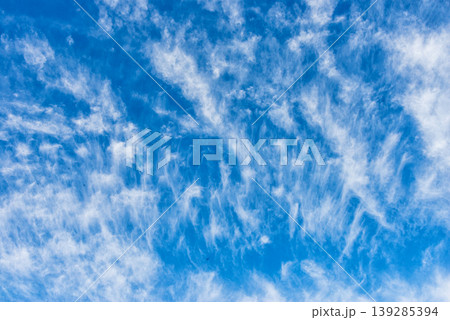 Blue sky with scattered clouds natural background texture 139285394