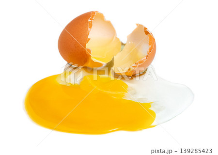Raw egg yolk and white on white 139285423