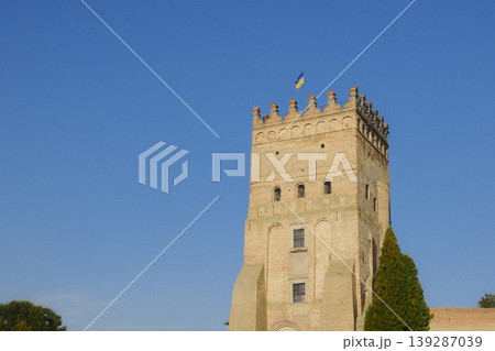 The tower shows the Flag of Ukraine waving from the top of Lubart's Castle The tower shows the Flag of Ukraine waving from the top of Lubart's Castle 139287039