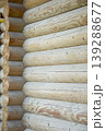 A corner of a timber frame made from logs with distinct texture 139288677