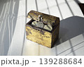 A wooden chest filled with Russian coins of various denominations 139288684