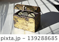 A wooden chest filled with Russian coins of various denominations 139288685