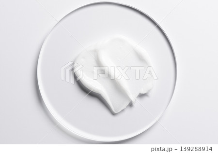 A sample of a cosmetic product. A moisturizing gel or shaving cream or body milk. A sample of a cosmetic product. A moisturizing gel or shaving cream or body milk. 139288914