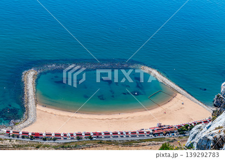 Sandy Bay is a picturesque beach located on the eastern side of the Rock of Gibraltar Sandy Bay is a picturesque beach located on the eastern side of the Rock of Gibraltar 139292783