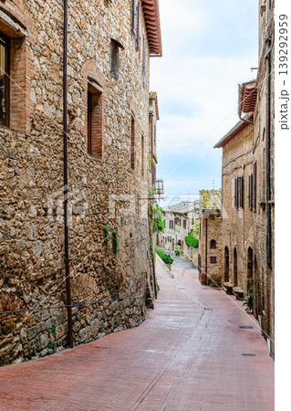 A walled medieval hill town San Gimignano, famous for its Romanesque and Gothic architecture, Italy A walled medieval hill town San Gimignano, famous for its Romanesque and Gothic architecture, Italy 139292959