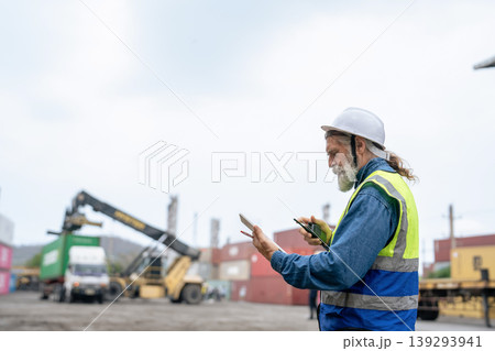 Engineers Inspect Cargo Shipment at Container Yard, Logistics Concept. 139293941