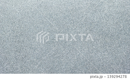 Light gray textured glitter background with fine grain pattern for minimalist design 139294278