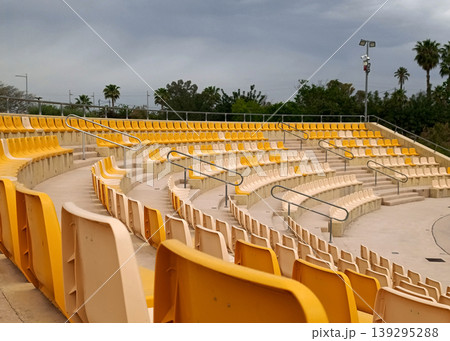 Empty Stadium Seats with Trees in Background 139295288
