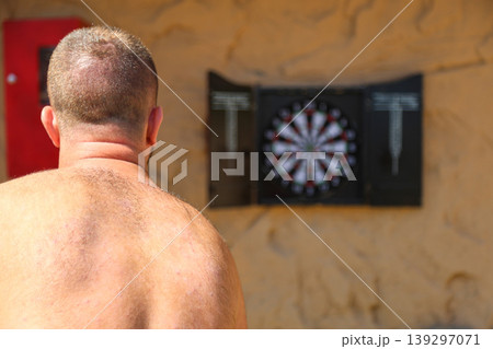 Egypt, Sharm el-Sheikh - September 30, 2025. Tourists spend their free time playing darts on the beach of the Savoy Hotel. Editorial Egypt, Sharm el-Sheikh - September 30, 2025. Tourists spend their free time playing darts on the beach of the Savoy Hotel. Editorial 139297071