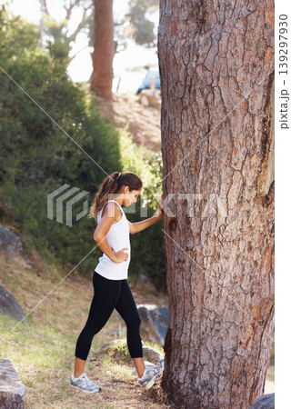 Forest, tree and tired fitness woman in nature for run, training or cardio workout break Sports, fatigue or female runner stop to breath in park with trunk support for balance, vertigo or dehydration Forest, tree and tired fitness woman in nature for run, training or cardio workout break Sports, fatigue or female runner stop to breath in park with trunk support for balance, vertigo or dehydration 139297930