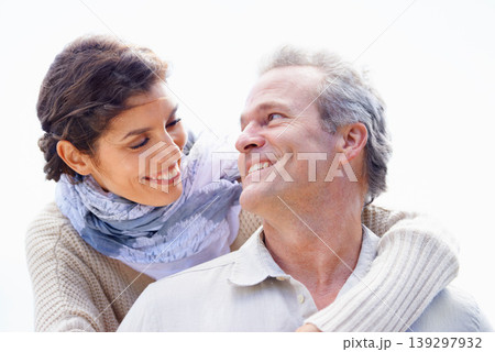 Couple, face and laughing outdoor with hug for romance, love and relationship in nature with date. Mature, man and woman or embrace with happy, playful and joy for bonding, honeymoon and support Couple, face and laughing outdoor with hug for romance, love and relationship in nature with date. Mature, man and woman or embrace with happy, playful and joy for bonding, honeymoon and support 139297932