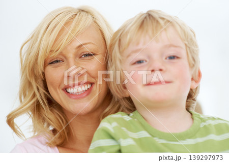 Portrait, face and mom smile with child for love, care and bonding together in studio isolated on white background. Mothers day, young boy kid and happy for childhood support, freedom and development 139297973
