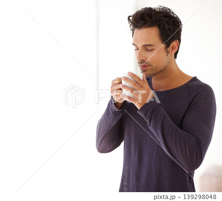 Man, coffee and face with aroma or smile in the morning for relax, peace and satisfaction at home. Person, happy and thoughtful with espresso, beverage or hot chocolate for smell, wellness or ideas Man, coffee and face with aroma or smile in the morning for relax, peace and satisfaction at home. Person, happy and thoughtful with espresso, beverage or hot chocolate for smell, wellness or ideas 139298048