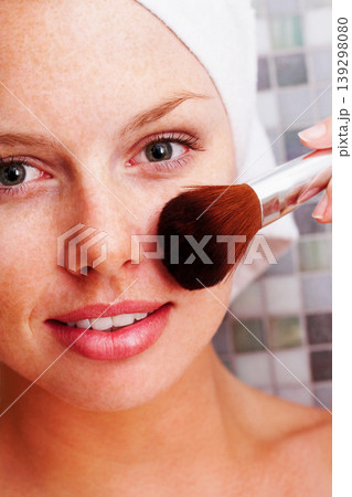 Portrait, smile and woman with makeup, brush or results in bathroom closeup for wellness. Happy, face and female person with beauty, tools or foundation, cosmetics or powder application after shower Portrait, smile and woman with makeup, brush or results in bathroom closeup for wellness. Happy, face and female person with beauty, tools or foundation, cosmetics or powder application after shower 139298080