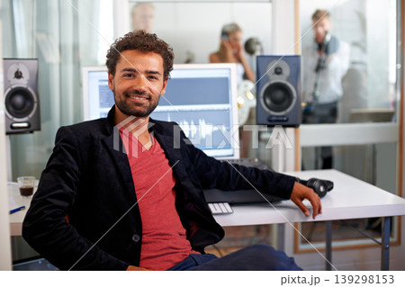 DJ, happy musician and recording studio portrait with a man and music producer with tech and computer. Engineer, audio technician and media with a professional in sound booth with synthesizer DJ, happy musician and recording studio portrait with a man and music producer with tech and computer. Engineer, audio technician and media with a professional in sound booth with synthesizer 139298153