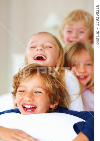Portrait, love or funny with brother and sister sibling children on a bed in their home together. Family, happy or laughing with young boy and girl kids in the bedroom of an apartment on the weekend Portrait, love or funny with brother and sister sibling children on a bed in their home together. Family, happy or laughing with young boy and girl kids in the bedroom of an apartment on the weekend 139298216