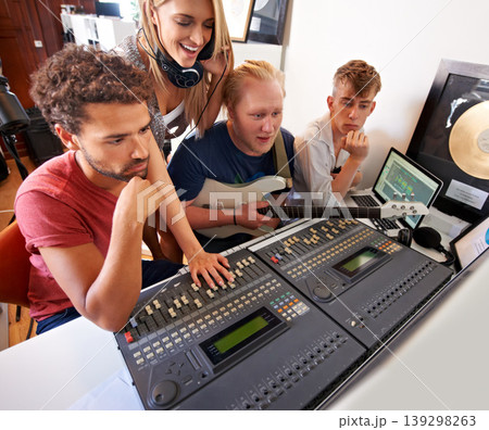Recording studio, music and people with producer for band songs, track and audio with musical instruments. Technology, soundboard and men and women with sound engineer or technician to record media Recording studio, music and people with producer for band songs, track and audio with musical instruments. Technology, soundboard and men and women with sound engineer or technician to record media 139298263