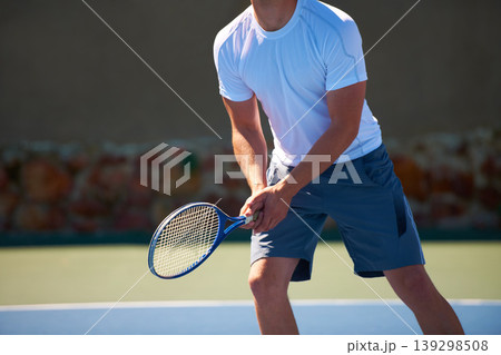 Man, racket and ready for tennis match, athlete and sports on court, turf and fitness. Male person, cardio and exercise or practice in outdoors, training and active for competition, skill and game 139298508